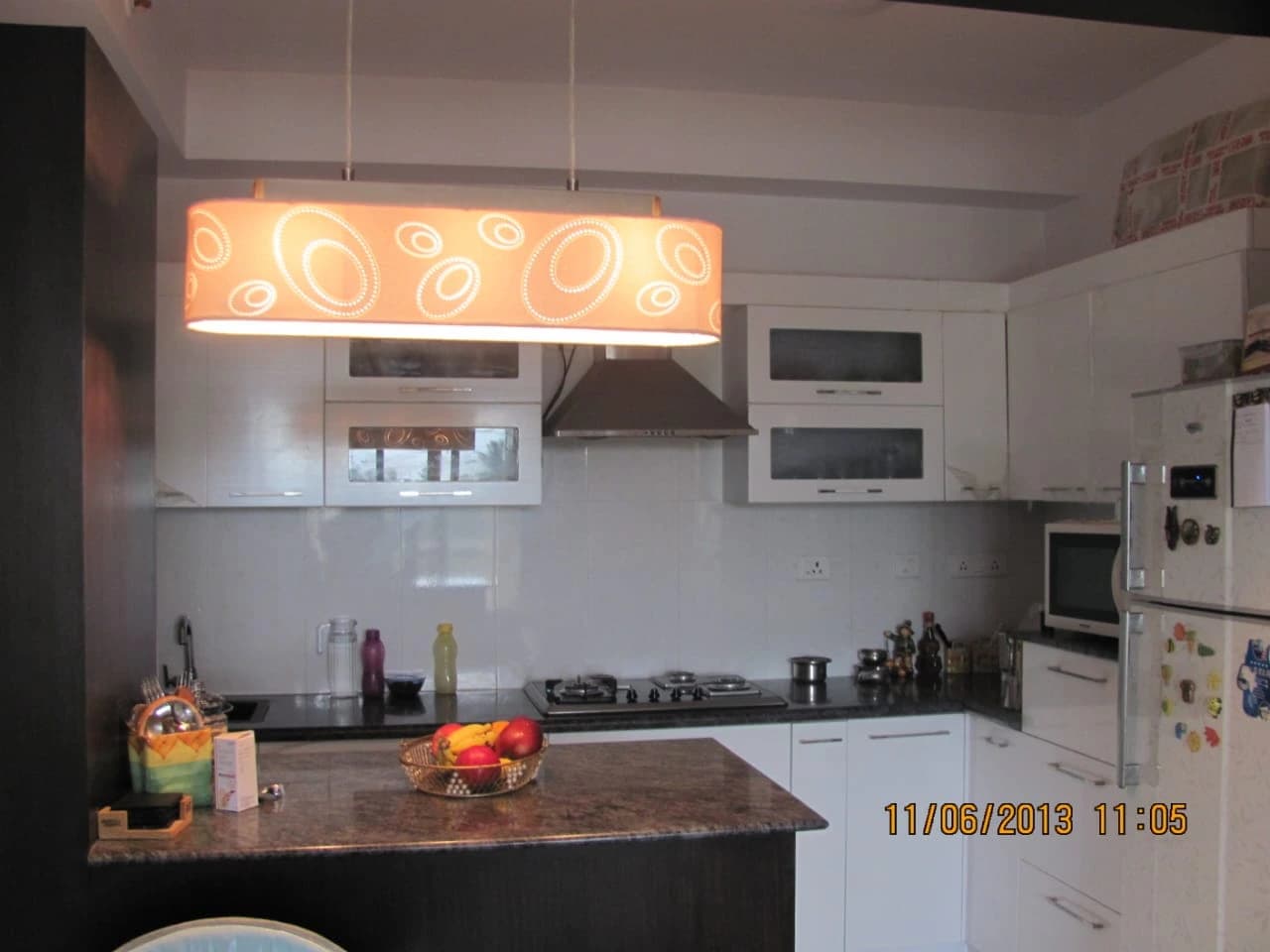 White Kitchen with Designer Lighting